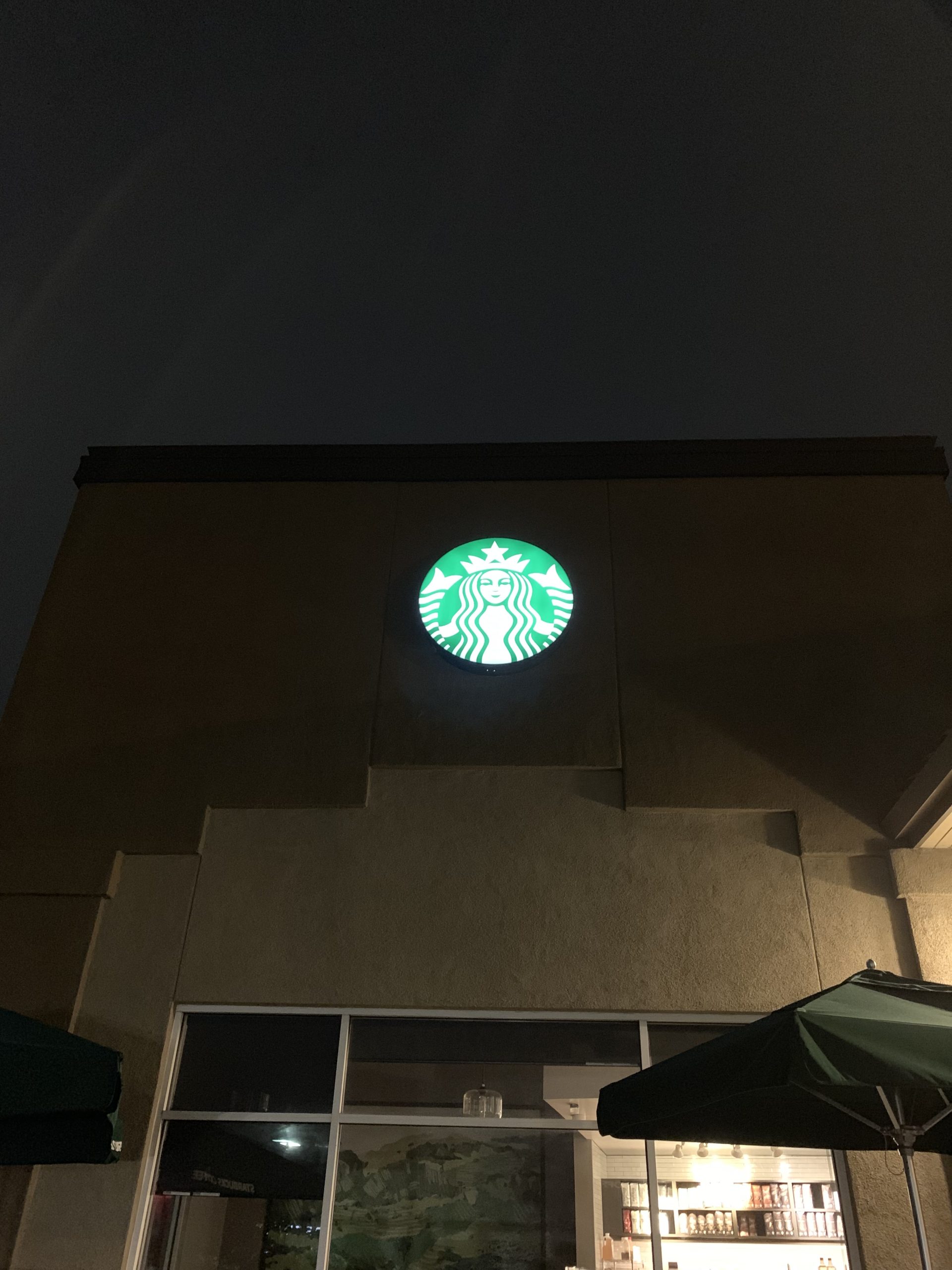 Illuminated Starbucks siren logo sign serviced by Signworks in Watsonville