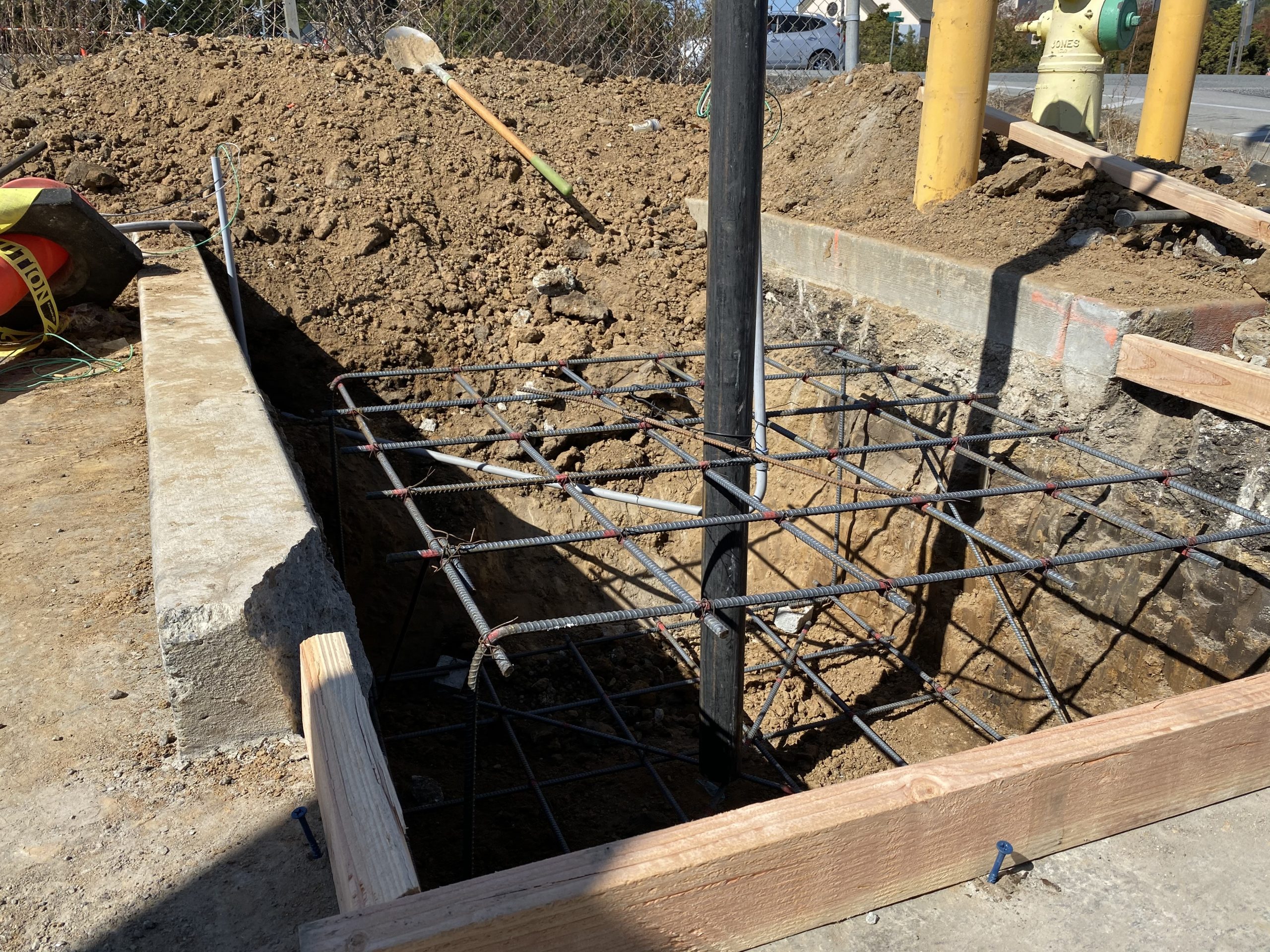 Rebar grid and concrete footing foundation for Rancho Del Mar monument sign installation